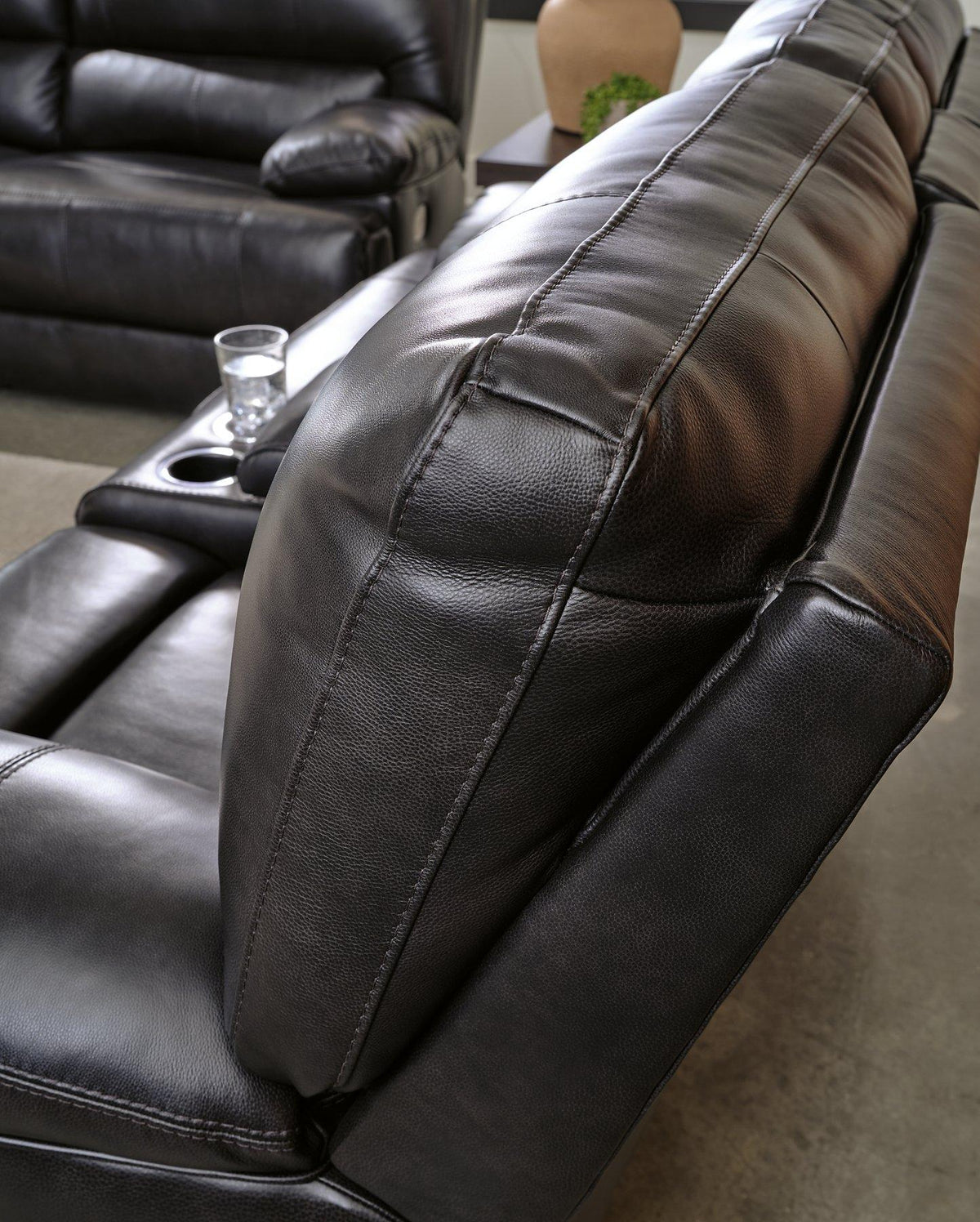 Elegant Ashley Furniture Mountainous Living Room Set with plush sofa and matching chairs in a modern living space.