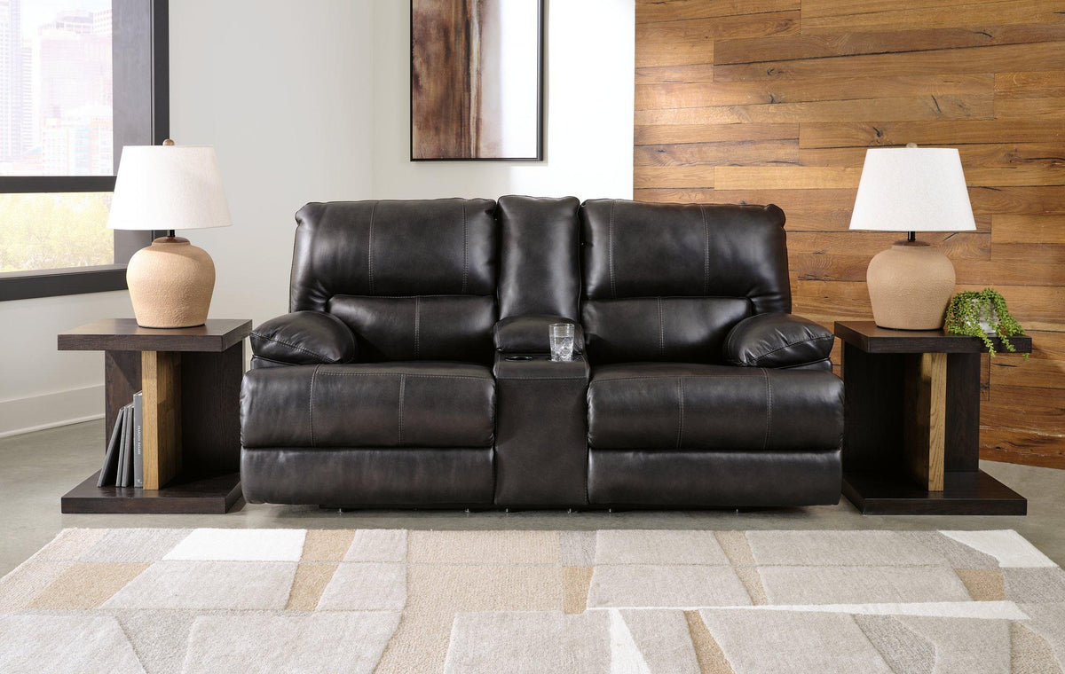 Ashley Furniture Mountainous Living Room Set featuring a sofa, armchair, and coffee table in a modern mountain-inspired design.