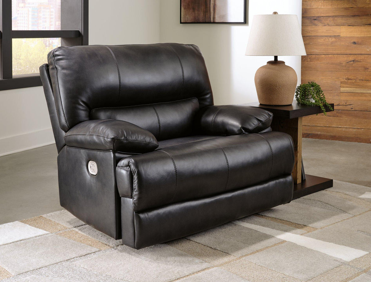 Ashley Furniture Mountainous Living Room Set featuring a sectional sofa with plush cushions and a matching coffee table.