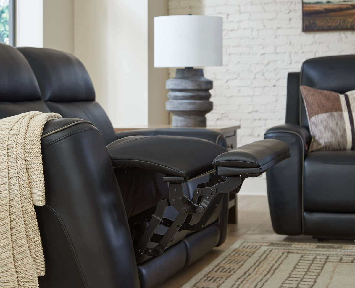 Ashley Furniture 5Z-Comfort Power Reclining Living Room Set with plush cushions and modern design, includes sofa and love seat.