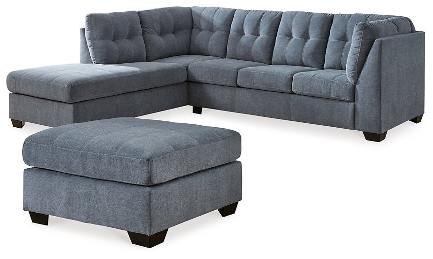 Ashley Furniture Marleton living room set featuring a sofa and loveseat with plush gray upholstery and contemporary design.