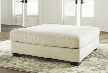 Ashley Rawcliffe Living Room Set with sofa and loveseat featuring neutral upholstery and modern design.
