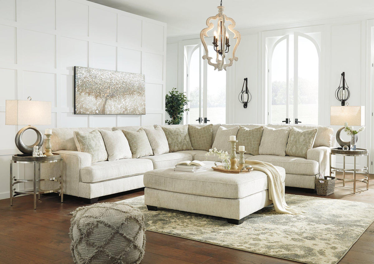 Ashley Furniture Rawcliffe living room set with sofa and armchair, featuring neutral fabric upholstery and modern design.