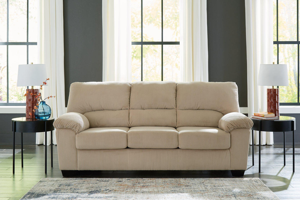 Ashley Furniture SimpleJoy living room set with a sofa, loveseat, and armchair arranged in a modern, cozy living space.