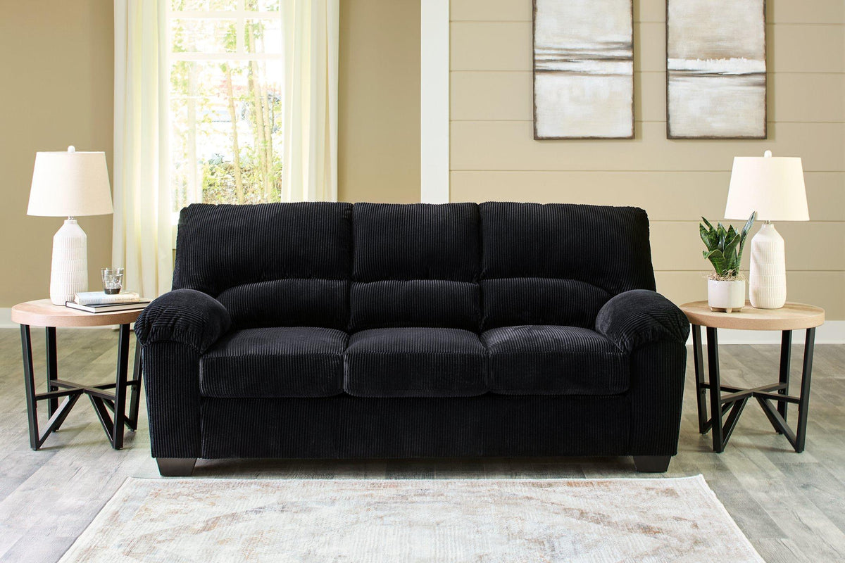 Ashley Furniture SimpleJoy living room set featuring a sofa and armchair with neutral fabric and modern design.