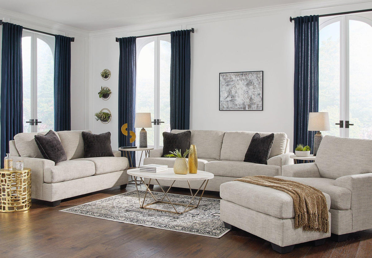 Ashley Furniture Vayda living room set with sofa and armchairs, featuring neutral upholstery and modern design.