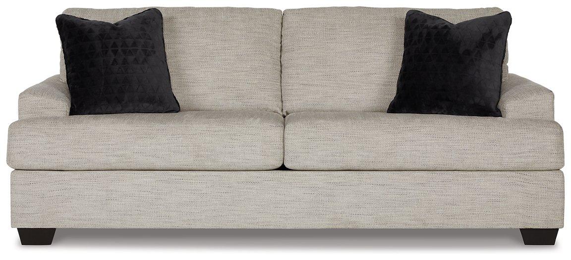 Ashley Furniture Vayda living room set with plush sofa and armchair, featuring neutral upholstery and modern design.