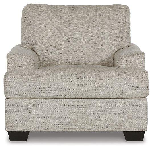 Ashley Furniture Vayda living room set featuring a sofa and armchair with neutral fabric and modern design.