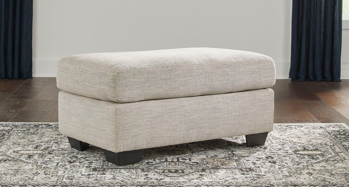 Ashley Furniture Vayda living room set with a sofa and armchair, featuring neutral upholstery and wood legs.