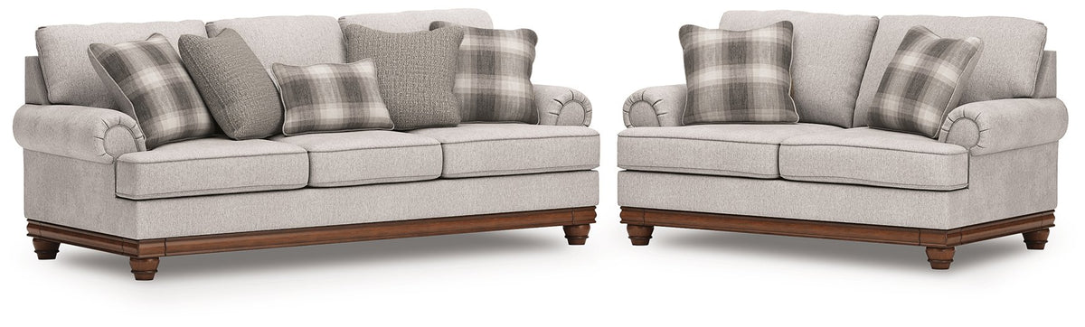 Ashley Furniture Clearbrooke living room set with sofa, loveseat, and chairs in a modern design, shown in a bright living space.