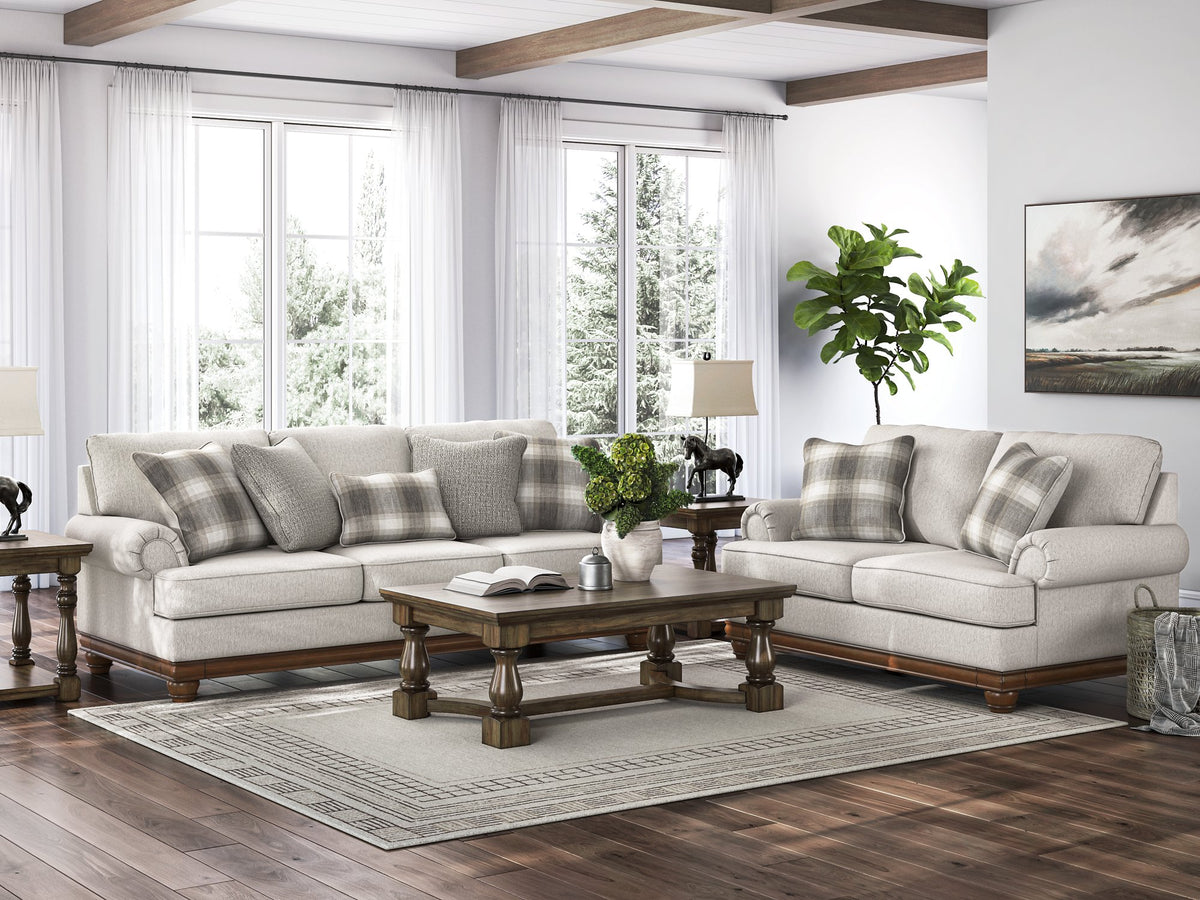 Ashley Furniture Clearbrooke living room set with sofa and matching armchair in a modern design, shown in a stylish living space.