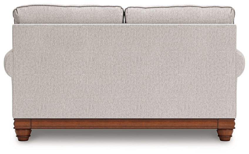 Ashley Furniture Clearbrooke living room set with plush sofas and armchairs arranged in a modern, stylish living space.