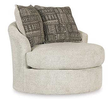 Ashley Furniture Soletren living room set with sofa and armchair, featuring neutral upholstery and modern design.