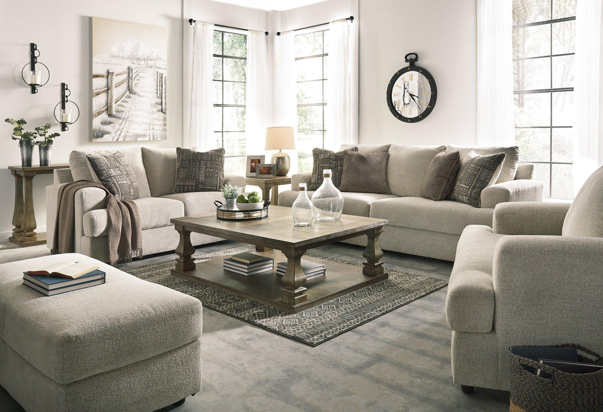 Ashley Furniture Soletren Living Room Set with sofa and armchair, featuring neutral upholstery and modern design.