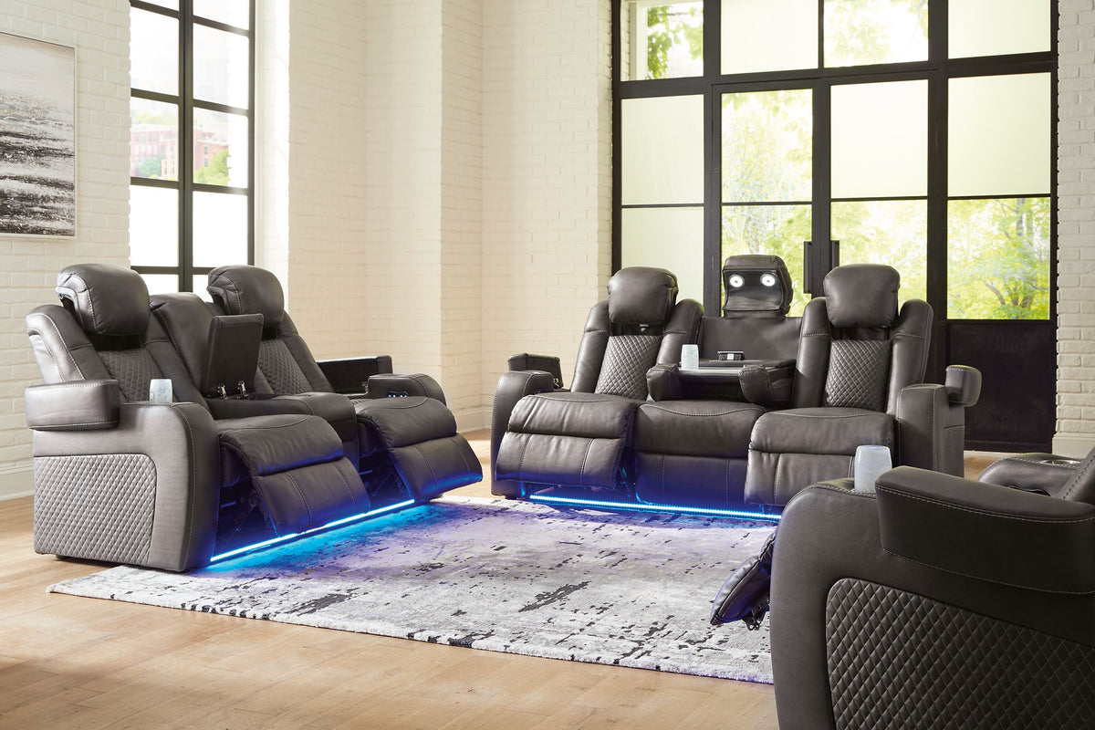 Ashley Furniture Fyne-Dyme living room set with plush sofa and matching armchair, featuring neutral fabric upholstery.