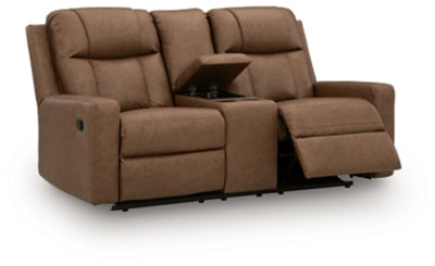 Ashley Furniture Mackmenville reclining loveseat with console, featuring plush fabric, padded armrests, and a built-in center console.
