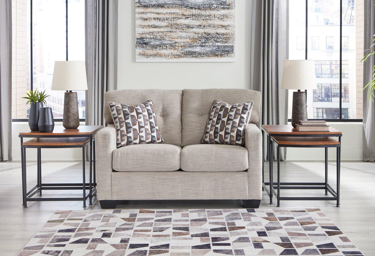 Ashley Mahoney loveseat with plush fabric and cushioned arms, perfect for cozy living room seating.