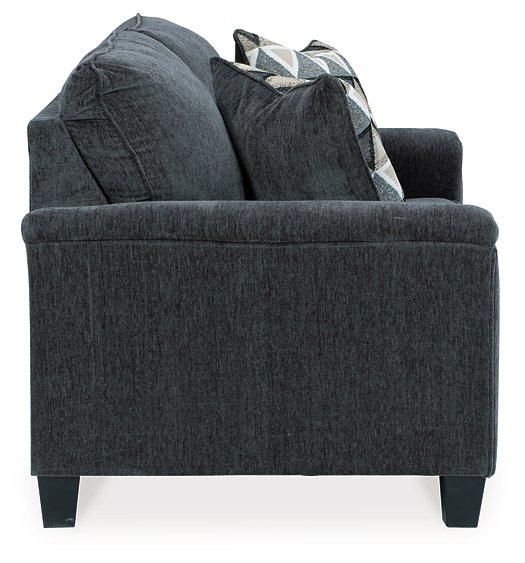 Ashley Furniture Abinger loveseat with plush cushions and neutral upholstery, perfect for cozy living room seating.