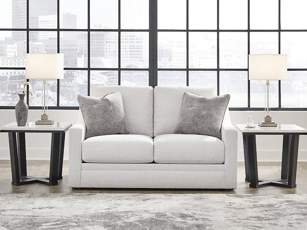 Ashley Furniture Adda Loveseat with plush fabric and modern design, shown in a cozy living room setting.