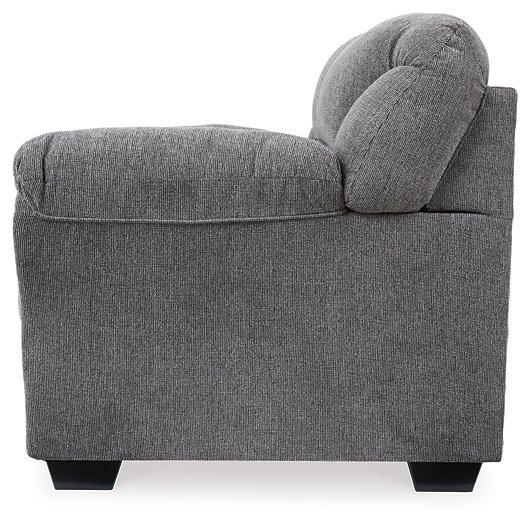Ashley Furniture Allmaxx loveseat with plush fabric and cozy cushions shown in the image.