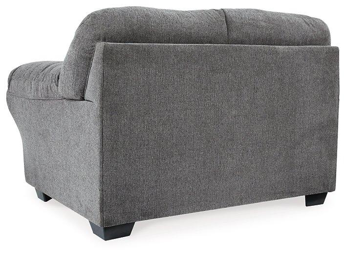 Ashley Furniture Allmaxx loveseat with plush cushions and sleek design, perfect for cozy living room seating.