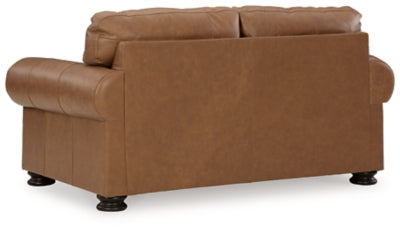 Ashley Furniture Carianna Loveseat with plush fabric and cushioned back, ideal for cozy living room seating.