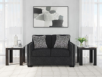 Ashley Furniture Jasmine Peaks Loveseat with plush fabric and cushioned armrests, perfect for cozy living room seating.