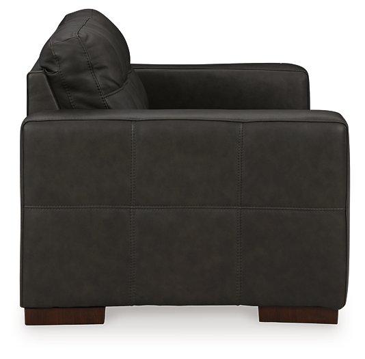 Ashley Furniture Luigi Loveseat with plush cushions and stylish design, perfect for small living rooms or cozy spaces.