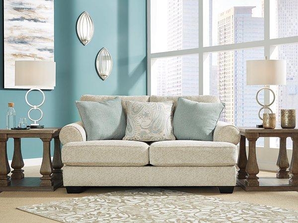 Ashley Monaghan loveseat with plush fabric and cushioned seating, ideal for cozy living room setups.