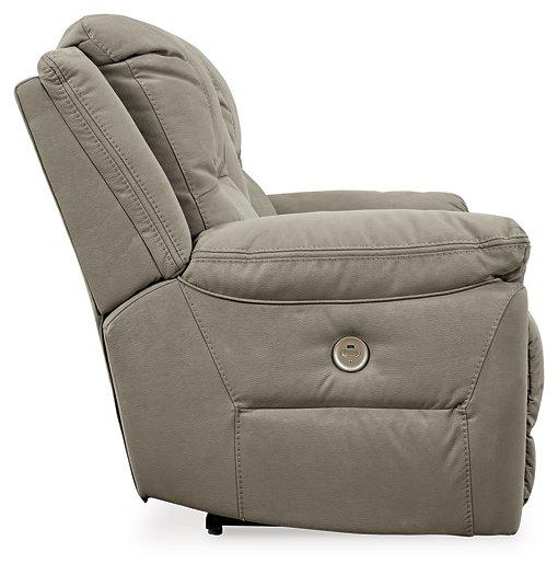 Ashley Furniture Next-Gen Gaucho Power Reclining Loveseat with console, featuring plush upholstery and built-in cup holders.