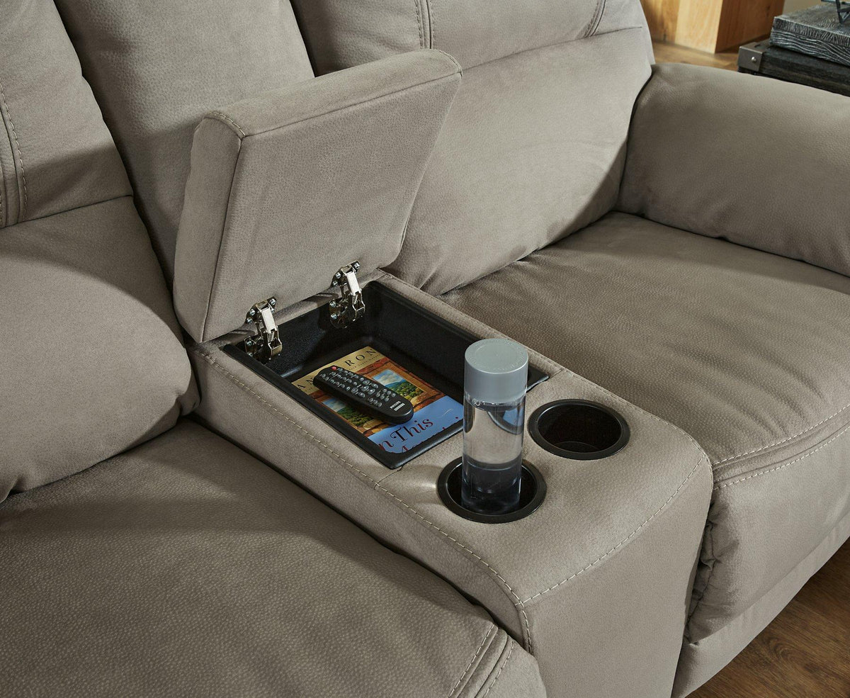 Ashley Furniture Next-Gen Gaucho Power Reclining Loveseat with built-in console, featuring plush cushions and reclining seats.