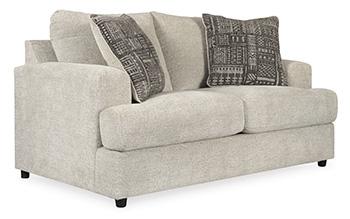 Ashley Furniture Soletren loveseat with plush fabric and cushioned armrests, perfect for cozy living room seating.