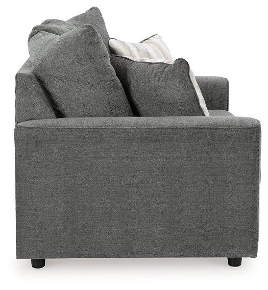 Ashley Furniture Stairatt loveseat showing plush fabric, cushioned backrest, and cozy seating in a modern living room setting.