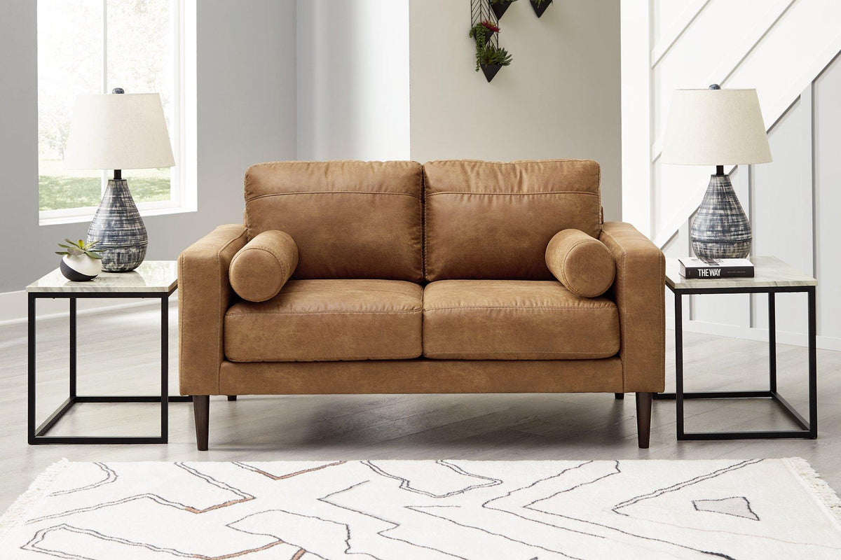 Ashley Telora loveseat featuring plush cushions and a modern design in a neutral fabric, perfect for living room seating.