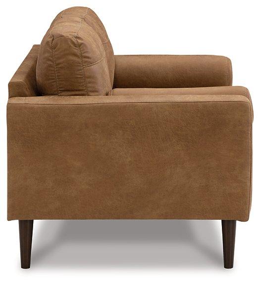 Ashley Telora Loveseat with plush fabric, cushioned armrests, and cozy seating in a modern living room setting.