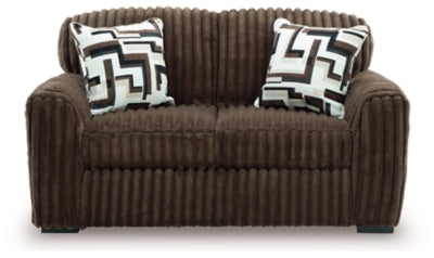 Ashley Furniture Midnight-Madness Loveseat with plush fabric and cozy cushions, shown from a head-on view.