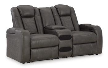 Ashley Furniture Fyne-Dyme power reclining loveseat with built-in console, featuring plush upholstery and ergonomic design.