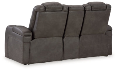 Ashley Furniture Fyne-Dyme power reclining loveseat with built-in console, shown from the back with plush upholstery and reclining features.