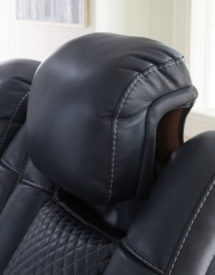 Ashley Furniture Fyne-Dyme Power Reclining Loveseat with console, showing plush fabric, reclining feature, and built-in center console.
