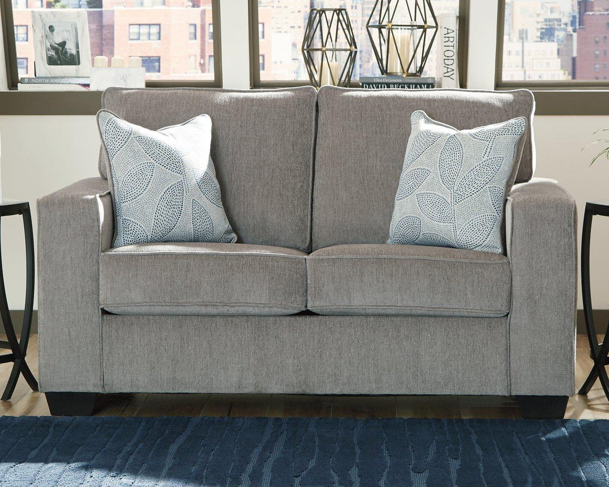 Ashley Furniture Altari loveseat with plush beige upholstery and cushioned armrests, ideal for cozy living room seating.
