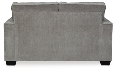 Ashley Furniture Altari loveseat with plush fabric, cushioned backrest, and wooden legs, shown in a cozy living room setting.