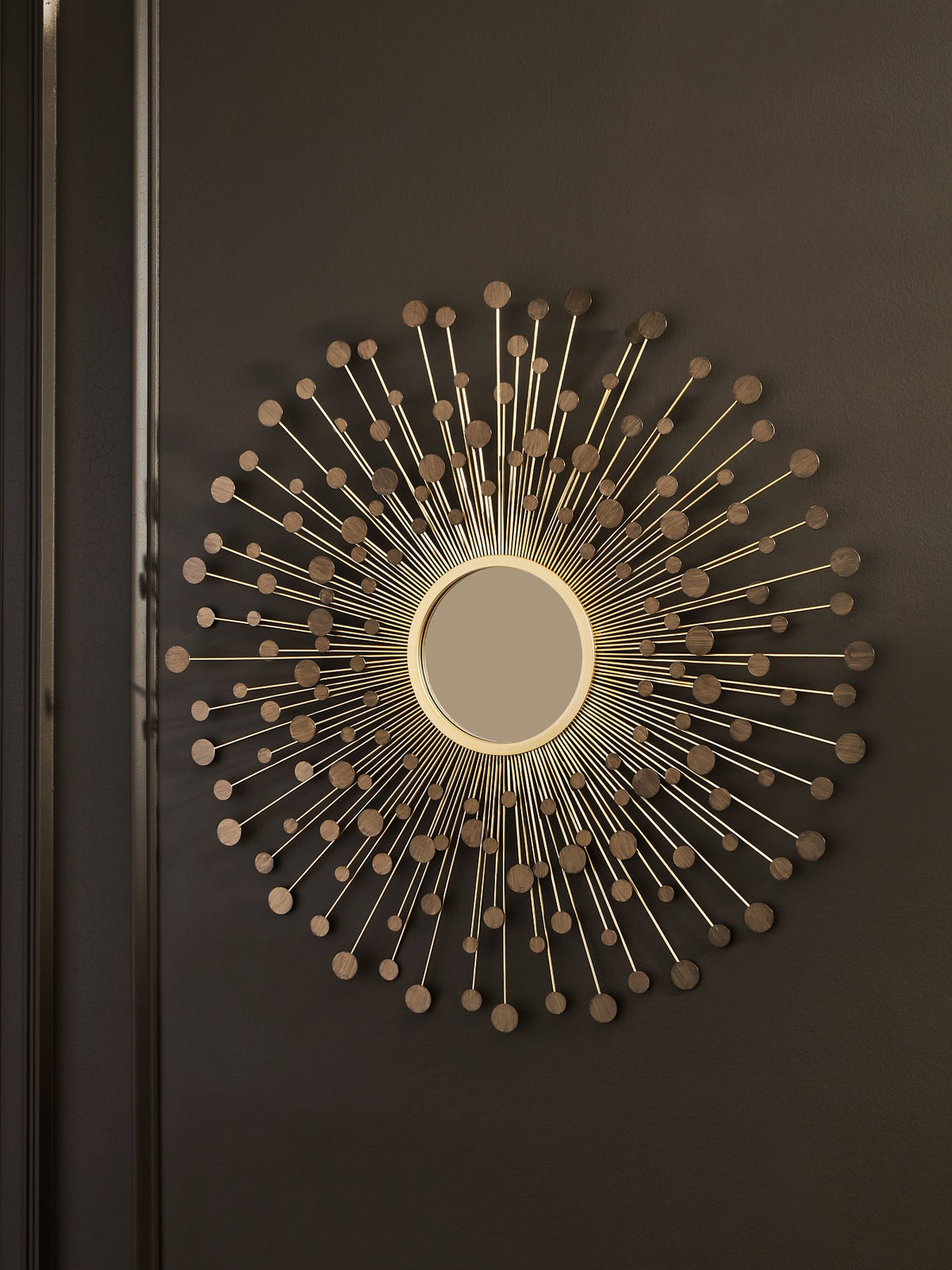 Ashley Furniture Morwenna accent mirror with a sleek, modern frame, perfect for enhancing living room or bedroom decor.