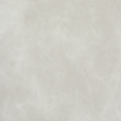 Ashley Furniture Ummi Swivel Accent Ottoman with plush fabric and modern design, shown in a neutral color.