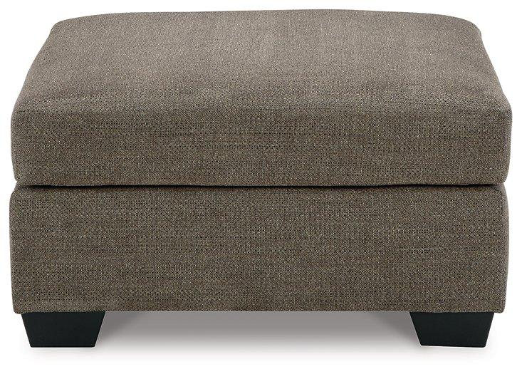 Mahoney Ashley Furniture oversized accent ottoman with plush fabric and sturdy wooden legs, perfect for living room decor.