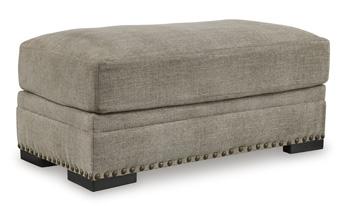 Ashley Furniture Galemore Ottoman with cushioned top and wooden legs, showcasing a stylish, neutral fabric finish.