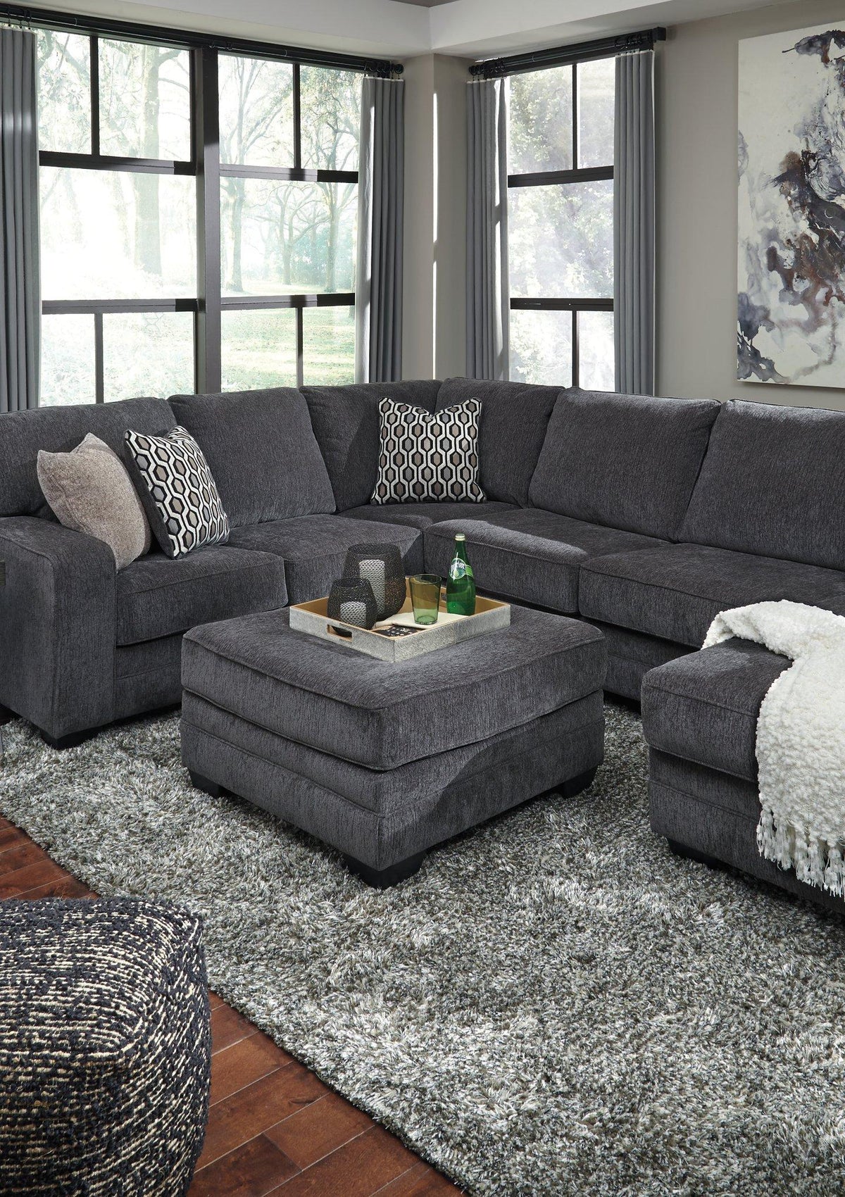 Oversized Tracling Ottoman by Ashley Furniture featuring soft fabric upholstery and a contemporary design for living room decor