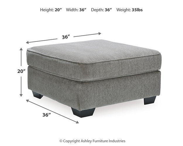 Oversized Altari accent ottoman by Ashley Furniture with plush fabric and tufted top, serving as a stylish living room accent piece.
