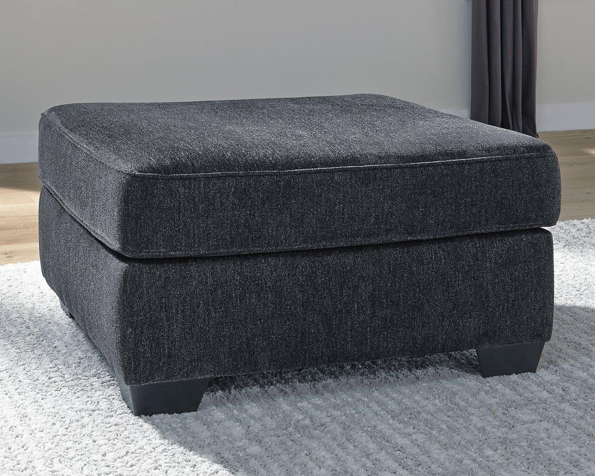 Oversized Ashley Furniture Altari accent ottoman with plush fabric and tufted top, perfect for living room decor.