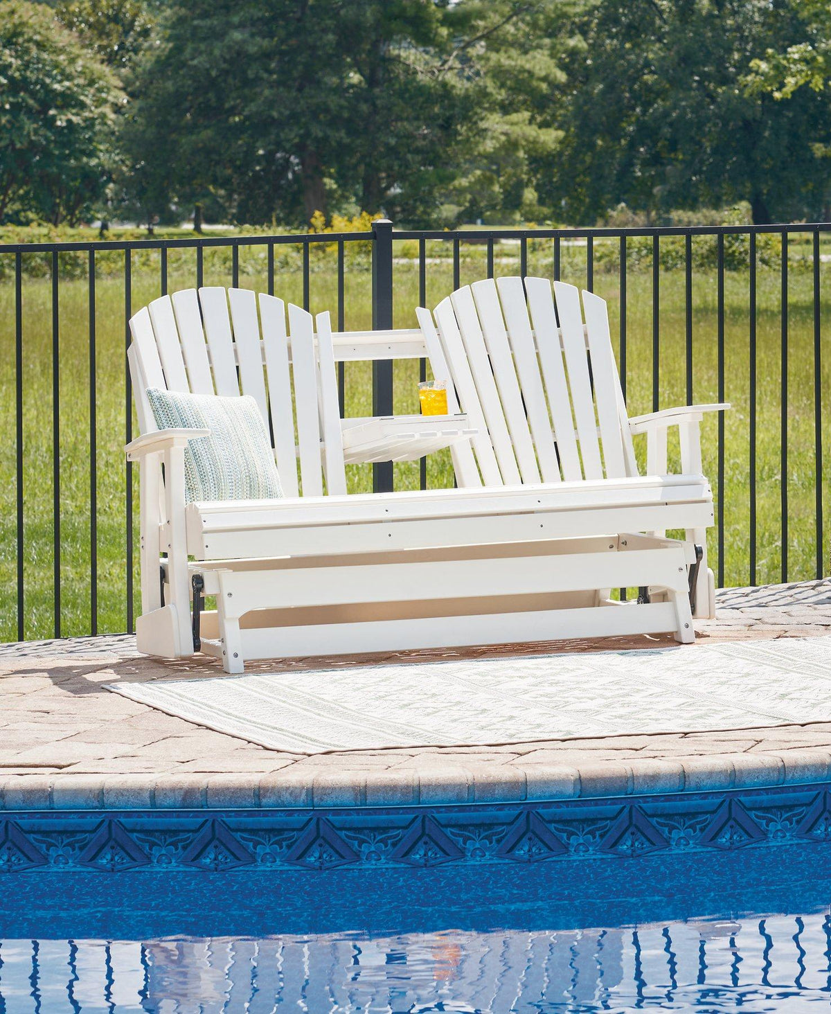 Outdoor loveseat from Ashley Furniture's Hyland Wave collection, featuring a comfortable glider design for outdoor seating.
