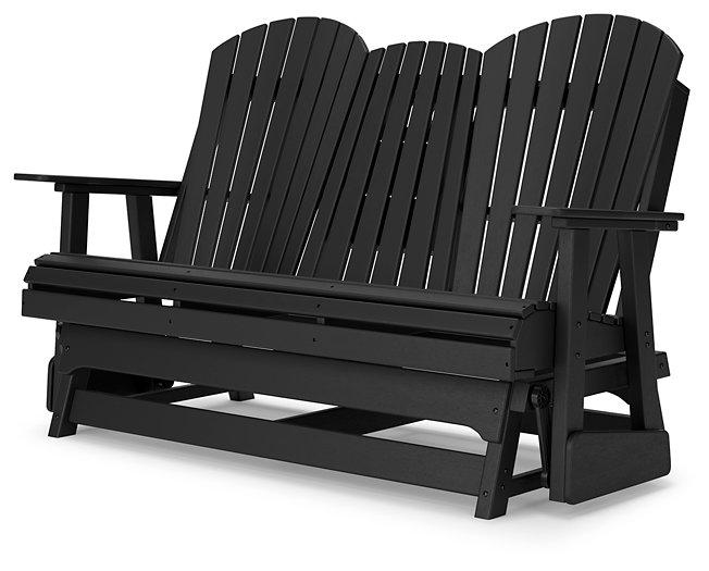 Outdoor loveseat by Ashley Furniture with a wave design, featuring cushioned seating and a sturdy metal frame for outdoor relaxation.